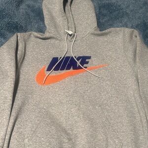 Nike Heather Gray Hoodie with Vibrant Orange and Deep Blue Logo